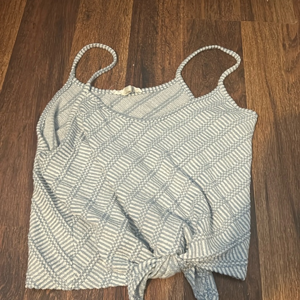 White and blue tank top that ties at the bottom